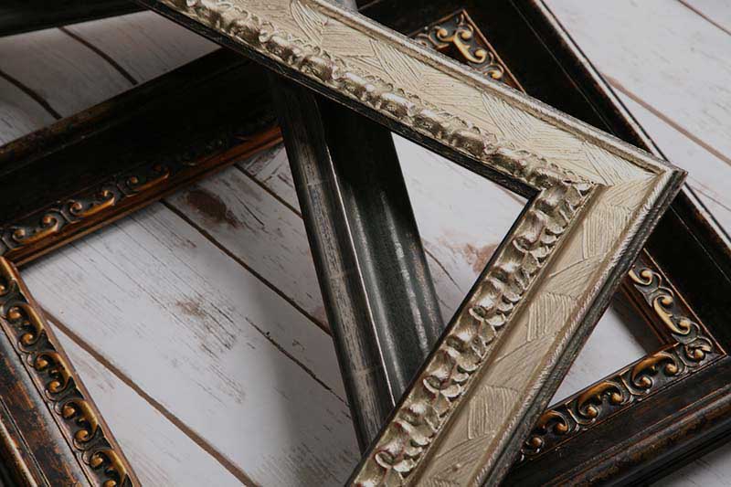 Picture Framing - Frames on Wood Planks Picture Framing - Frames on Wood Planks
