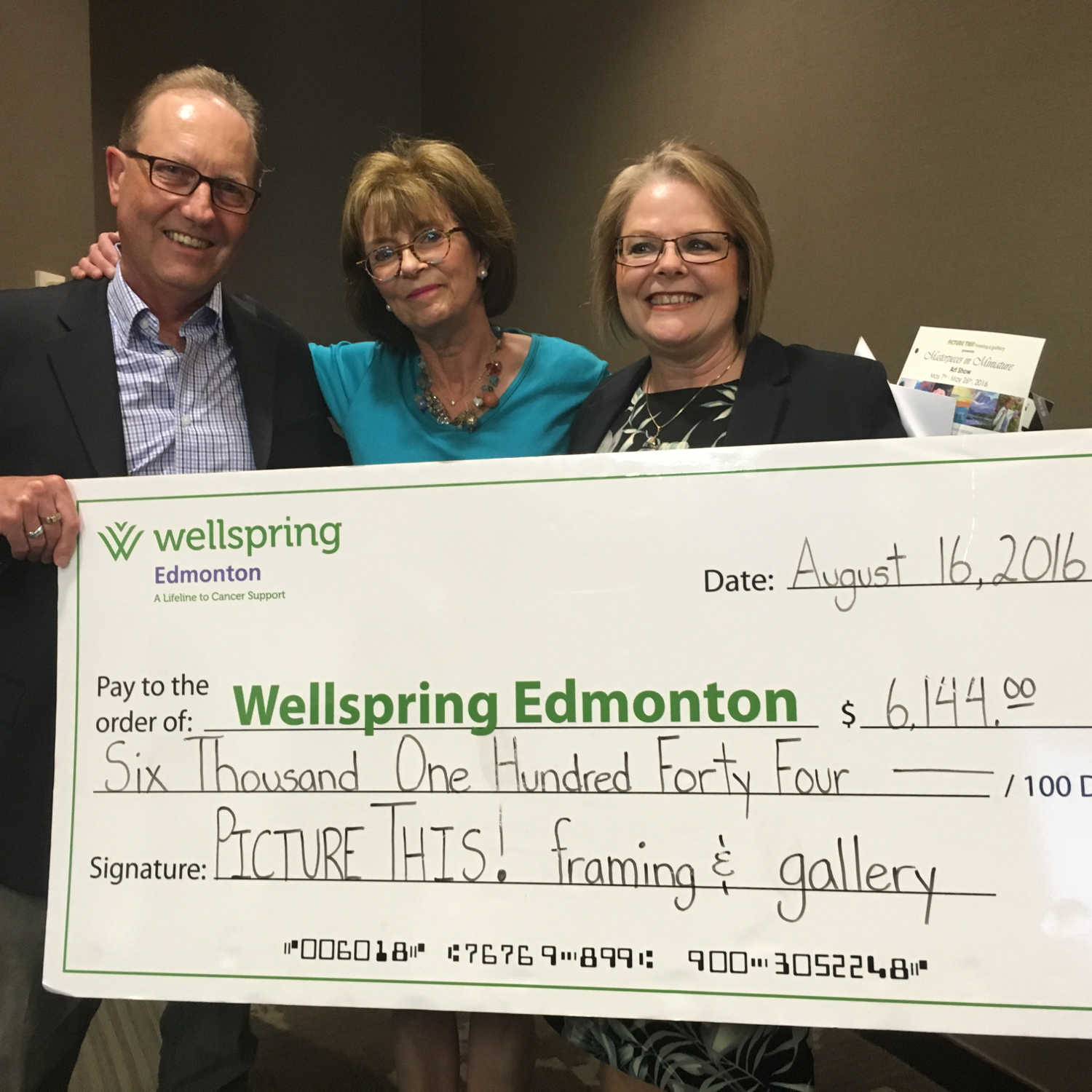 Picture This Presents Donation Cheque to Wellspring Edmonton Picture This Presents Donation Cheque to Wellspring Edmonton